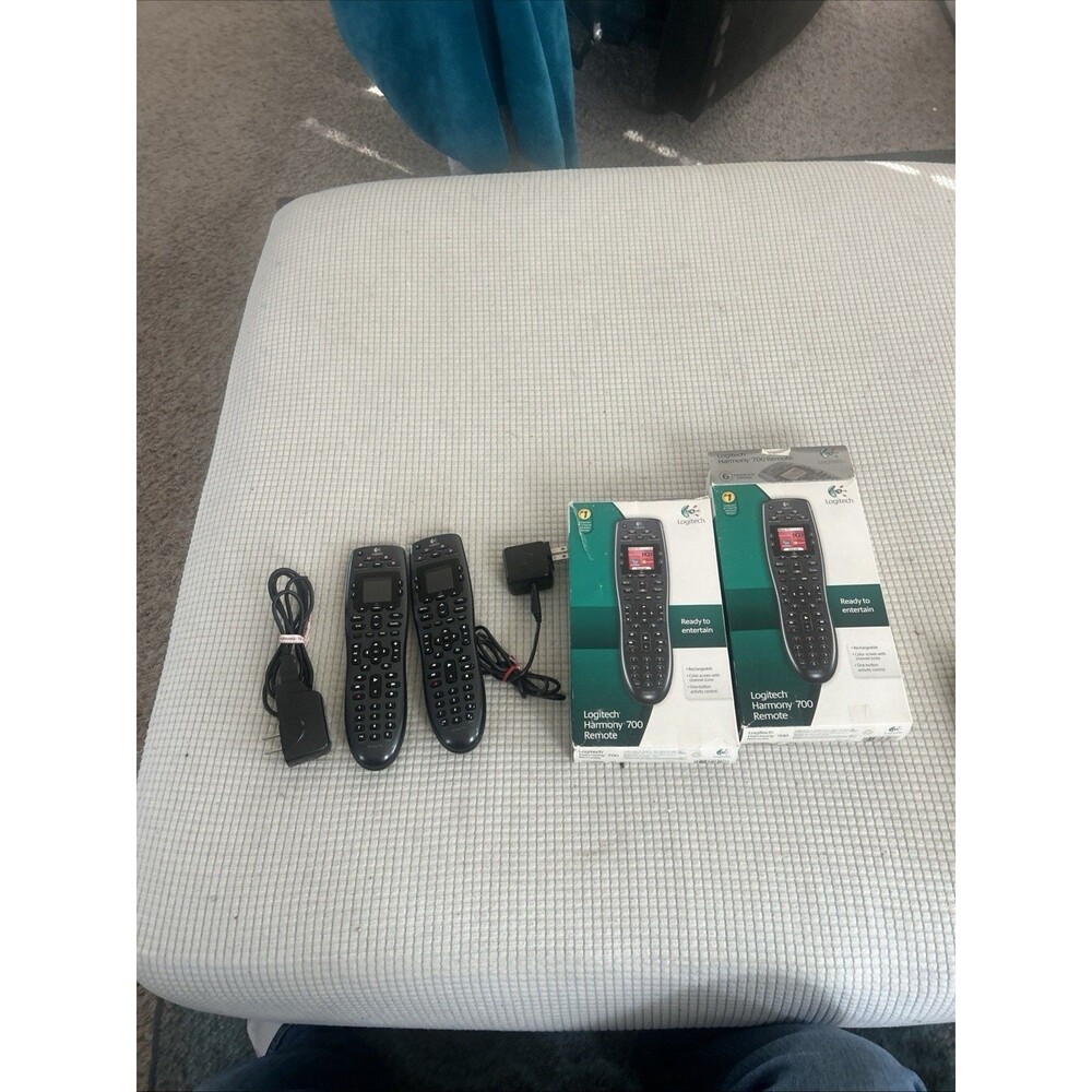 Pair Of NOT TESTED Logitech Harmony 700 Remotes With Power Cords